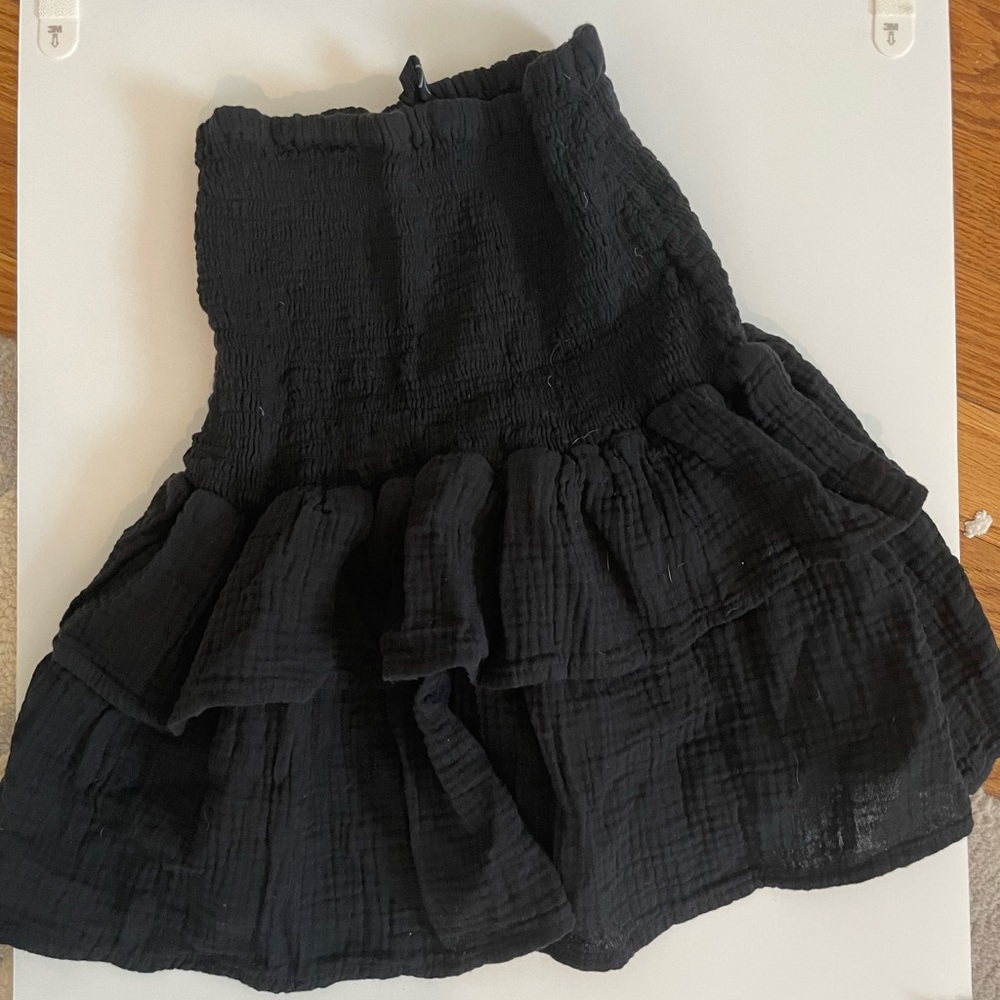 Black ruffle mini skirt